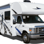 A white RV with black stripes, showcased at RV shows in California. RV Lifestyle Experts