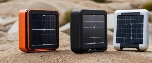 Three solar power kits sitting on the sand. RV Lifestyle Experts